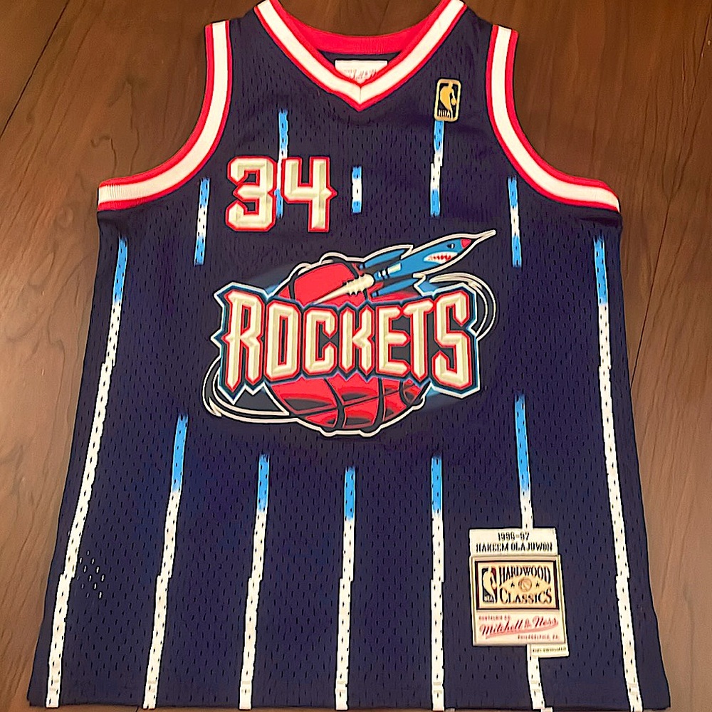 I am selling a medium sized Hakeem Olajuwon NBA jersey.This is number 10/12 made
